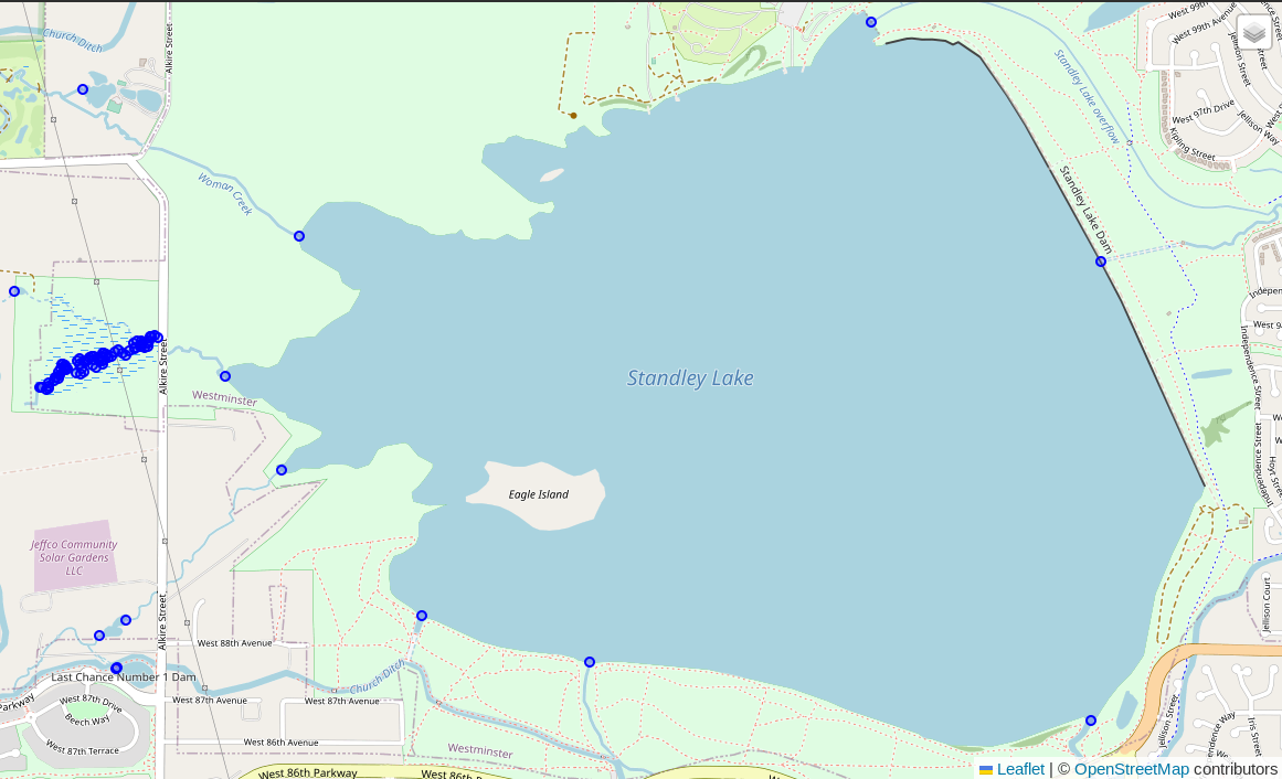 Screenshot from DBeaver showing the intersections between waterways (lines) and bodies of water (polygons) around Standley Lake as blue dots. The image shows many intersections are right on the boundary of the polygon, others have intersections throughout where the waterway line is extended into/through the polygon.