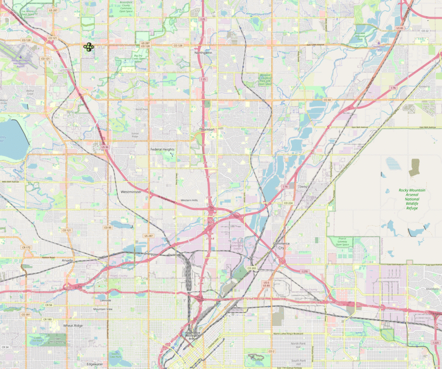 Animated images showing the 6 routes that pass within 1000 meters of each other. The area displayed includes Denver on the south edge, Wheat Ridge in the southwest corner, Arvada in the northwest quadrant, and Rocky Mountain Arsenal National Wildlife Refuge to the east.  The animation shows the routes in red, green, purple, blue, pink and yellow-green, with each route a set of dots surrounding the road it is traveling on.